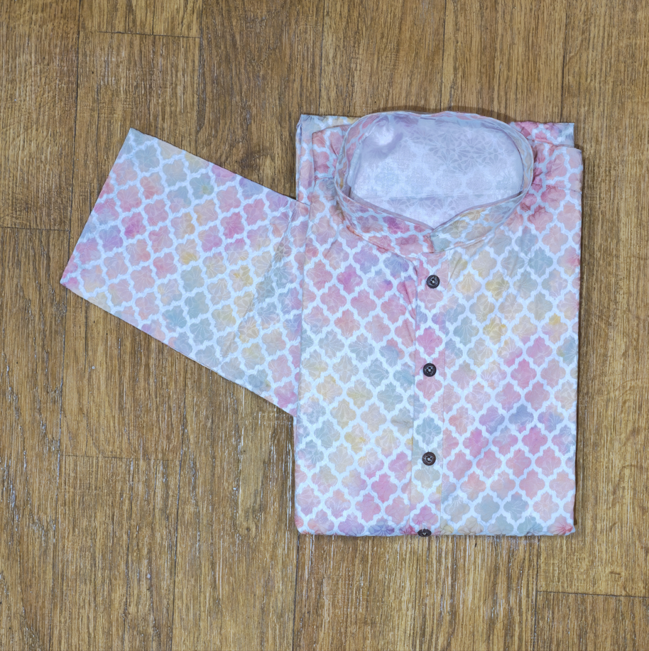 Floral patterned shirt with a matching eye mask on a wooden surface