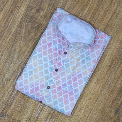 Floral-patterned shirt with a white undershirt on a wooden surface