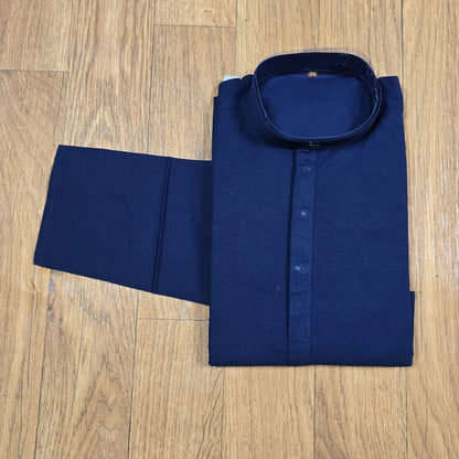 Folded Navy Blue mandarin collar Kurta on wooden floor