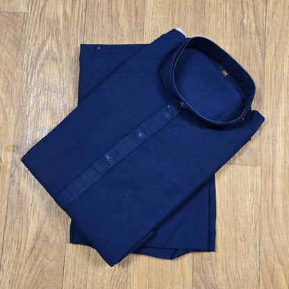 Folded Navy Blue mandarin collar Kurta on wooden floor