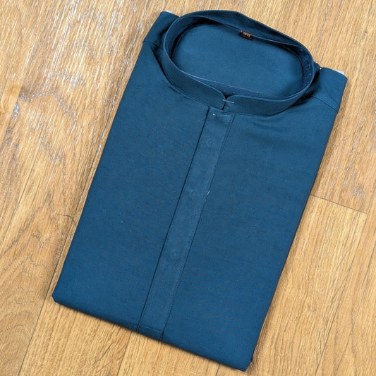 Folded Ocean Blue mandarin collar kurtawith brown buttons on wooden floor